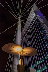 A modern solar street light installed in an urban setting.
