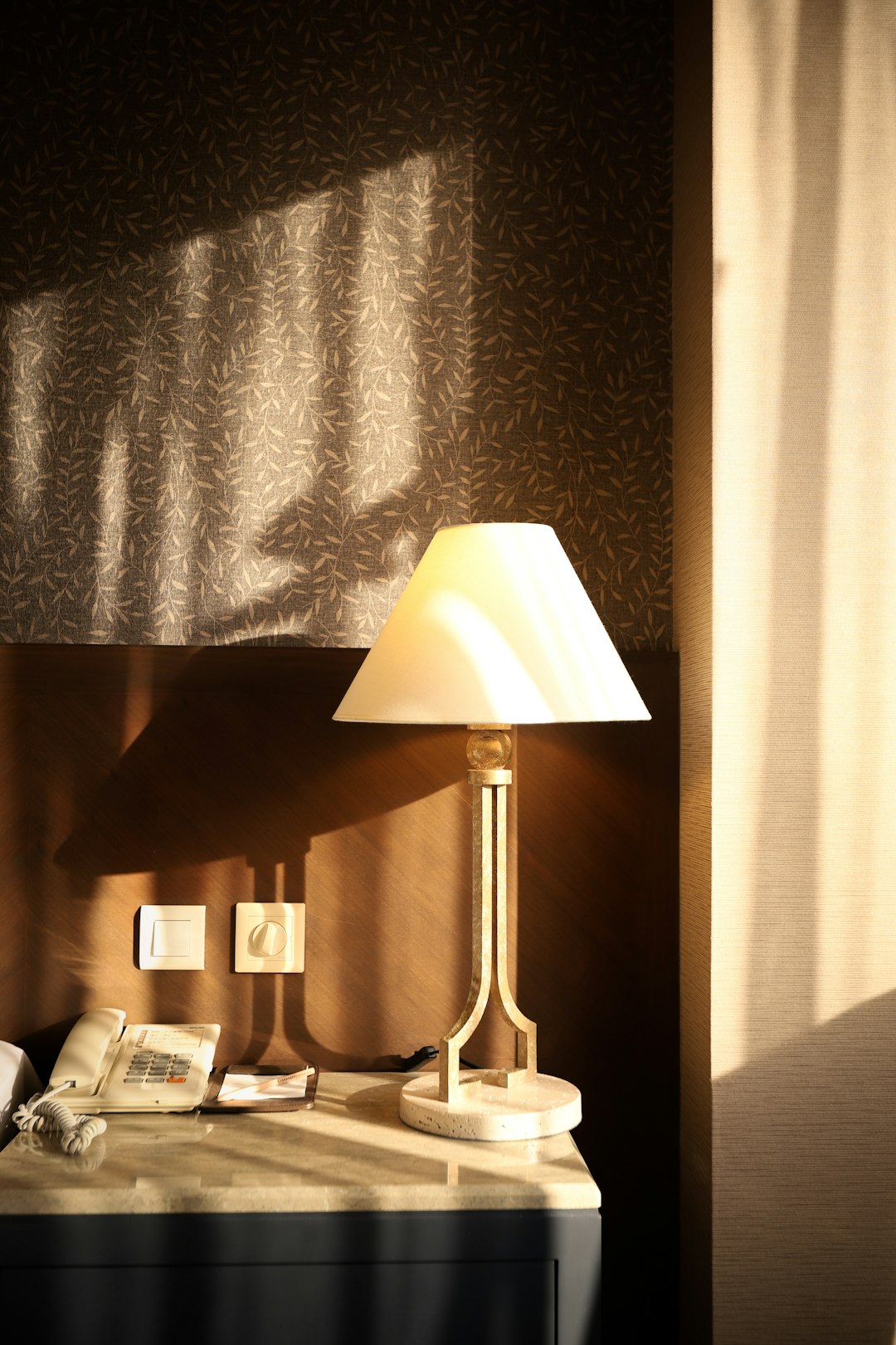 white table lamp on brown wooden table
