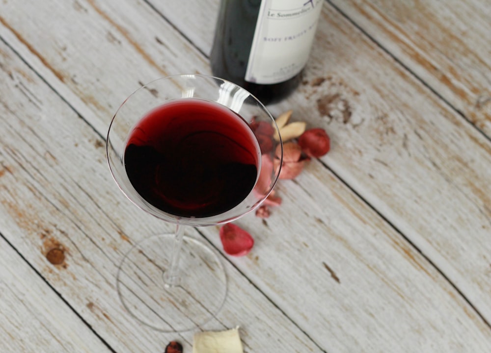 clear wine glass with red wine