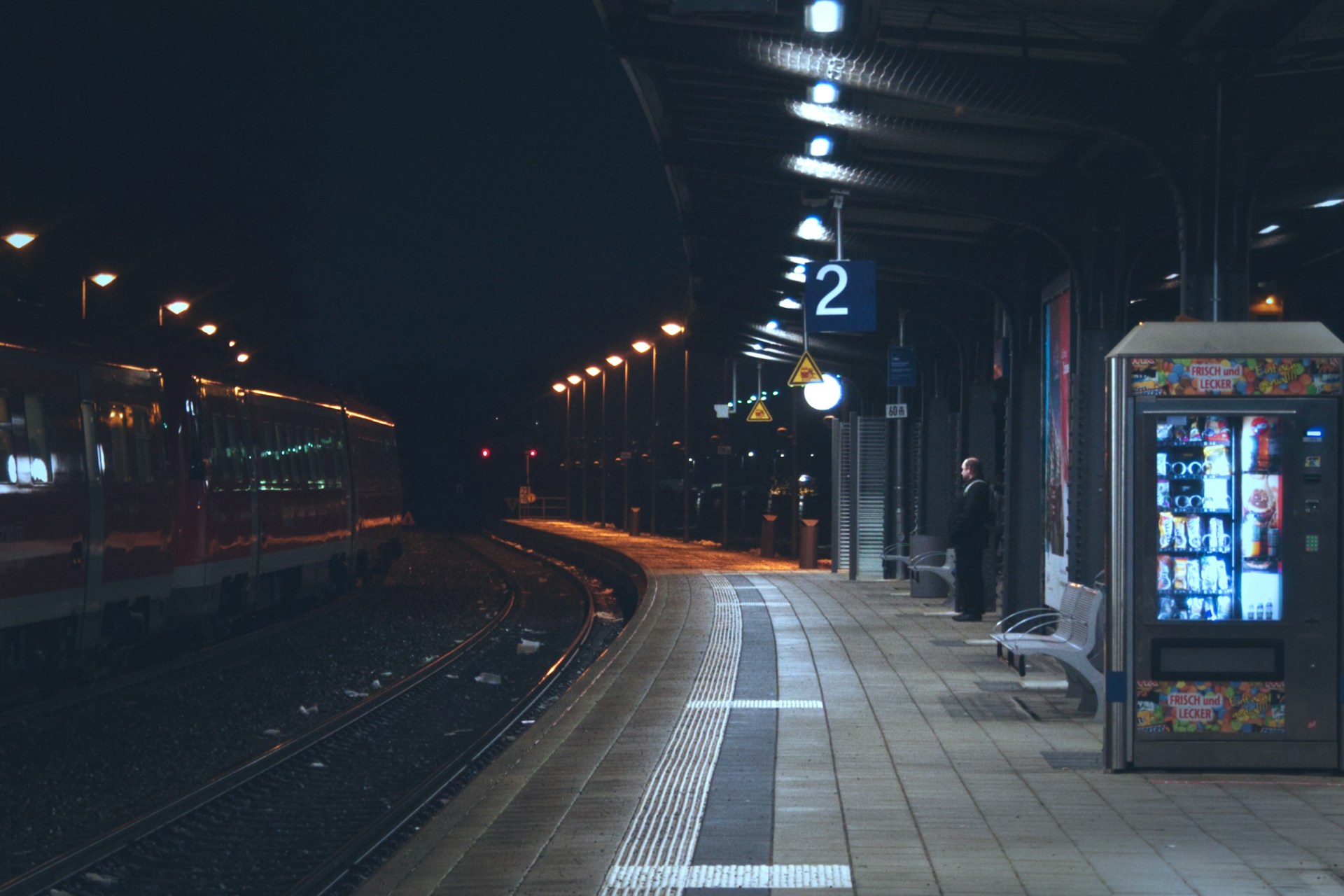 time lapse photography of train station during night time