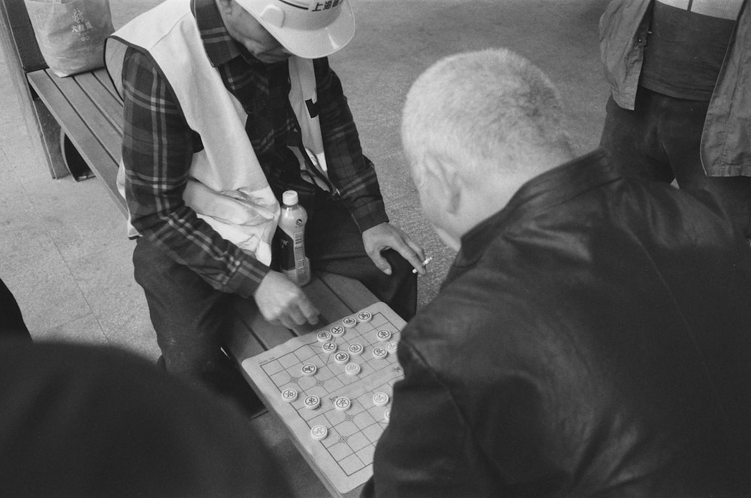 man in black suit jacket and white cowboy hat