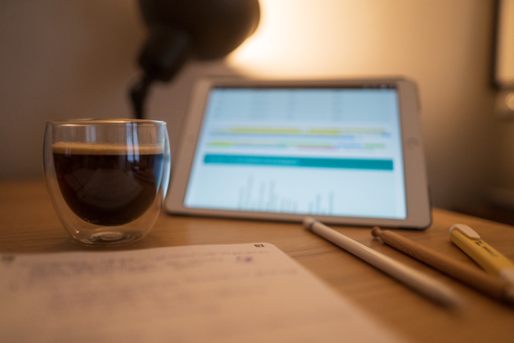 clear wine glass on brown wooden table