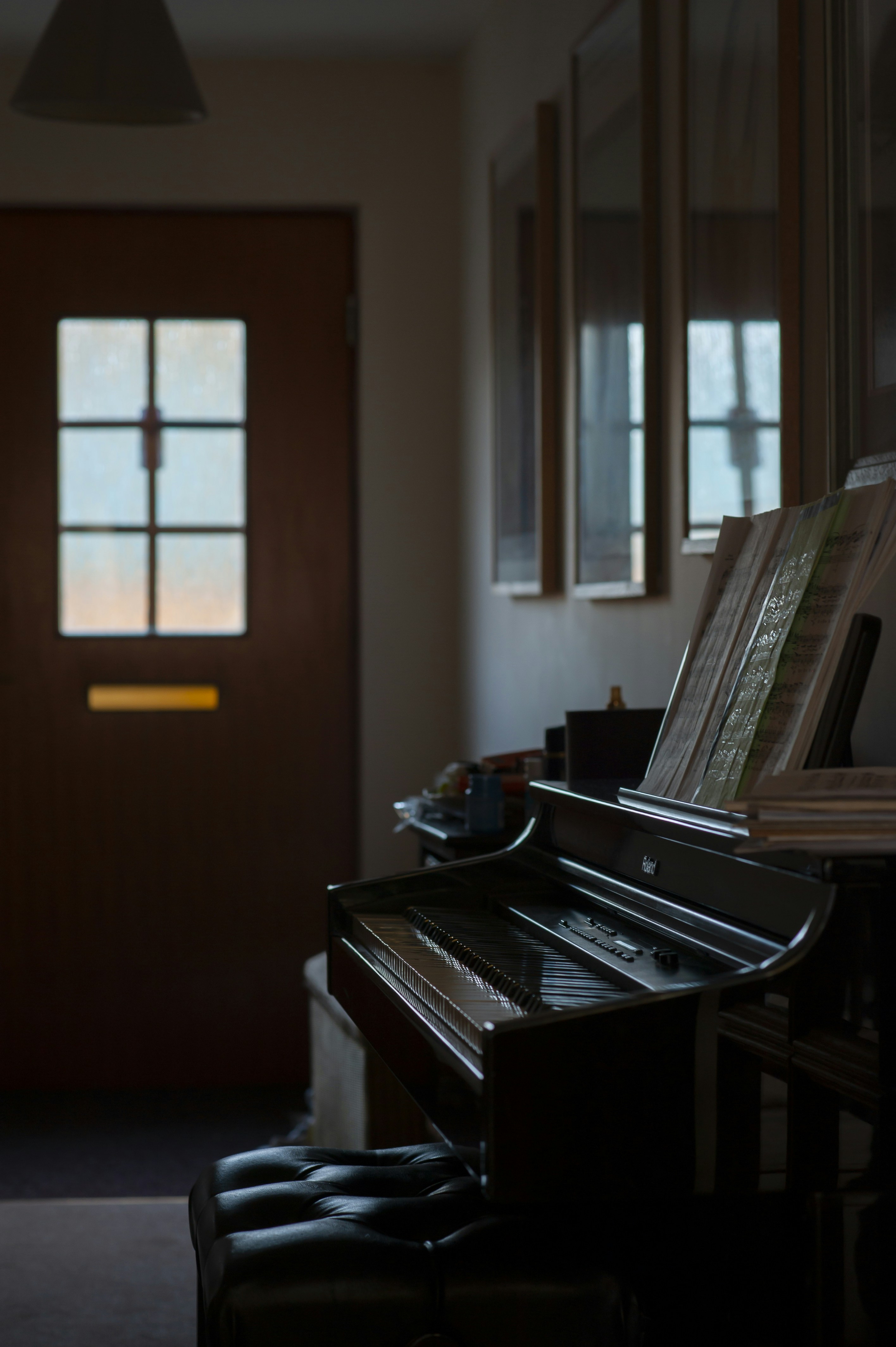 Black upright piano near window photo Free Piano Image on Unsplash