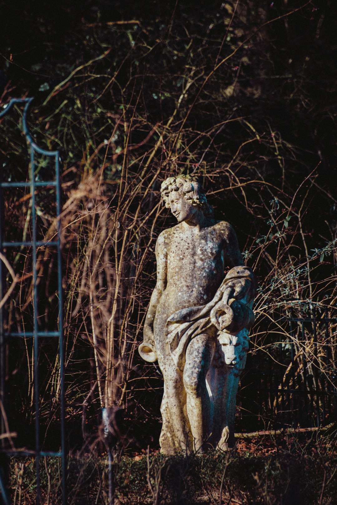 man with blue and white wings statue