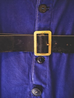 blue and gold belt buckle
