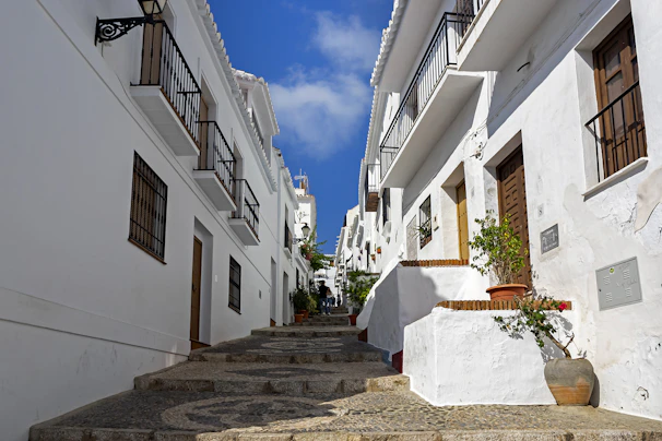 white concrete building under blue sky during daytime