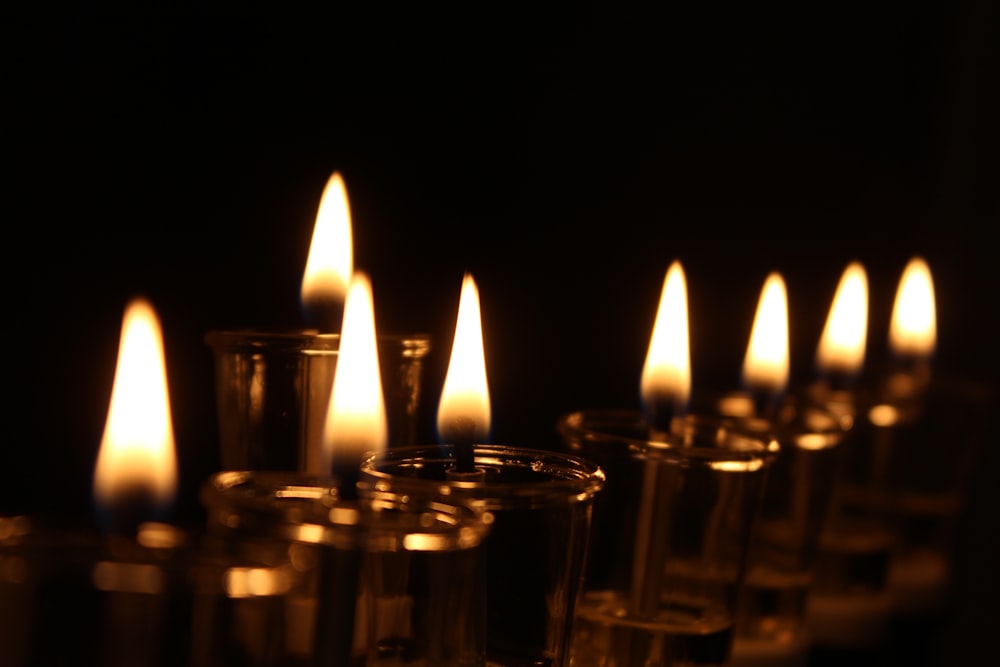 lighted candles on black background