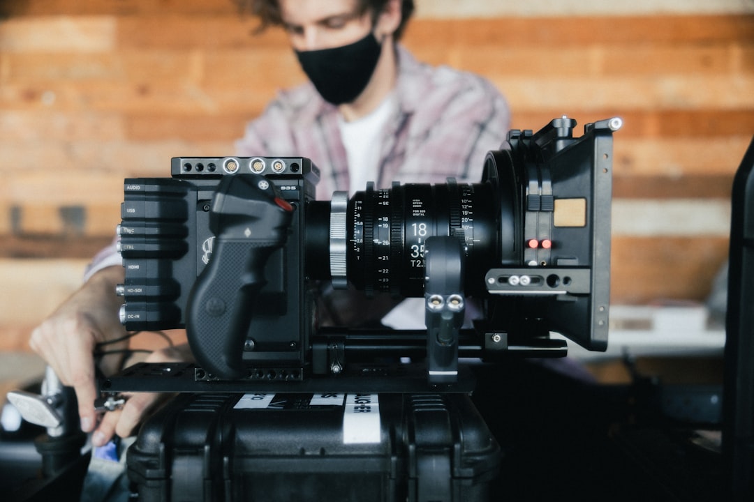 black dslr camera on black surface,