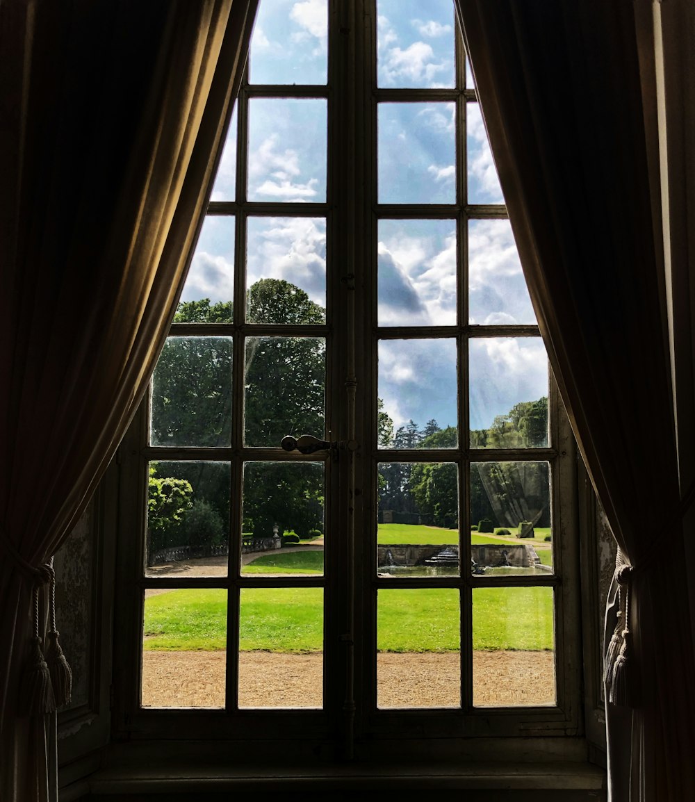 white wooden framed glass window