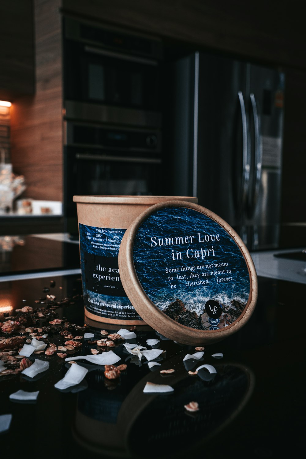 blue and white ceramic mug on brown wooden table