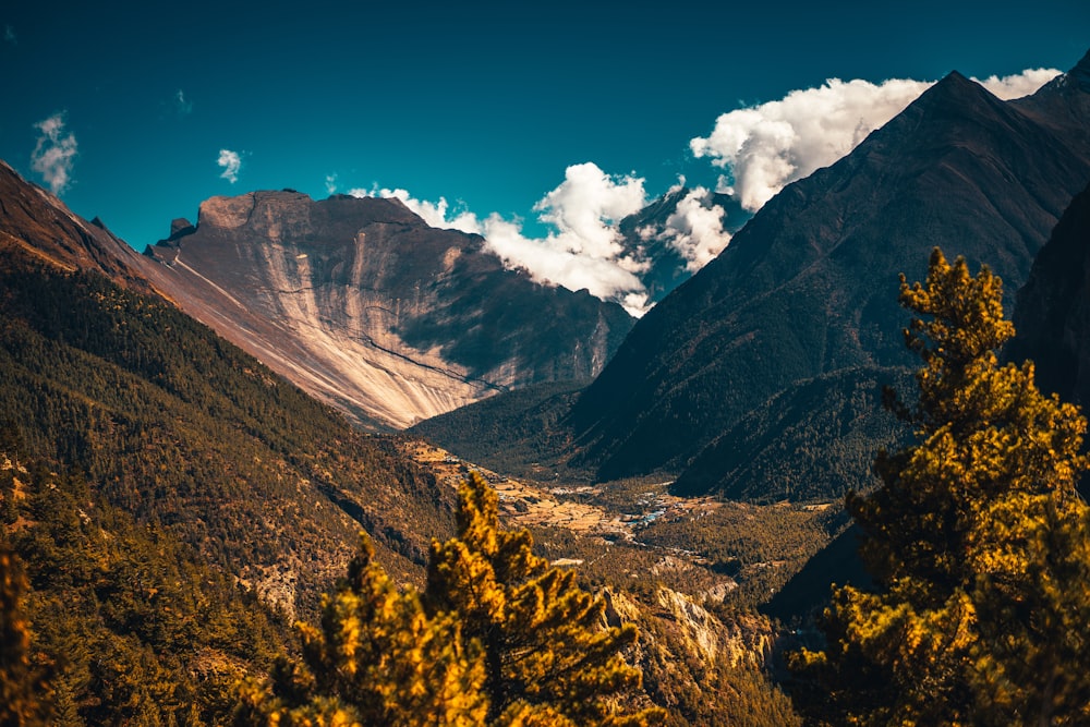 brown and green mountains under blue sky during daytime