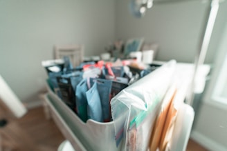 white plastic container with assorted items