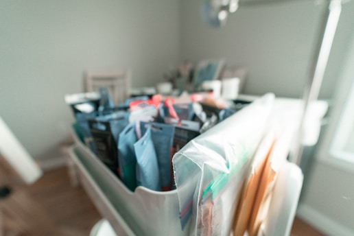 white plastic container with assorted items