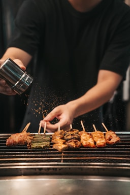 street photography,how to photograph fleshly splash; person holding stainless steel cup