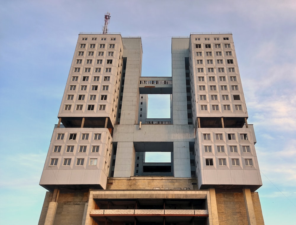 brown concrete building under blue sky during daytime