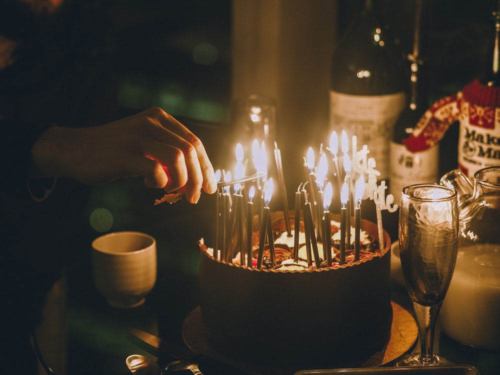 lighted candles on black table