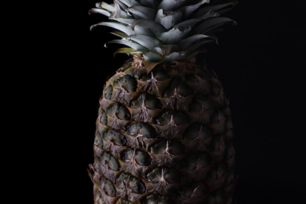 green and yellow pineapple fruit