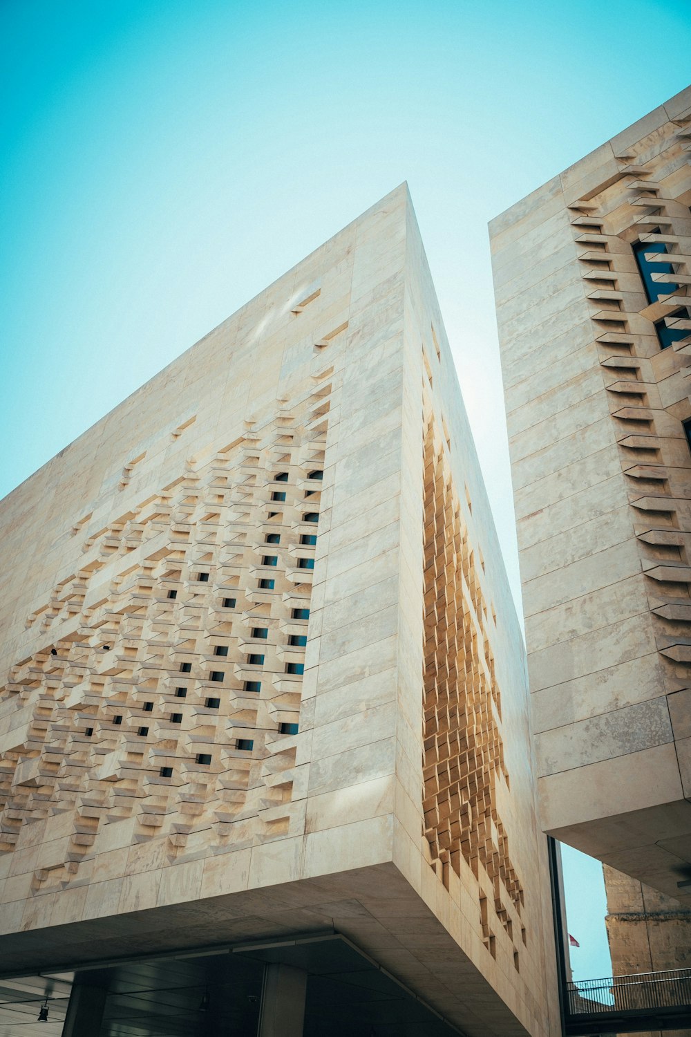 brown concrete building under blue sky during daytime