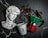A white marble bust of a classical figure is placed next to a white cup with the word 'Italy' and a moka pot in the colors of the Italian flag. Coffee beans are scattered on a dark marble surface around these objects.