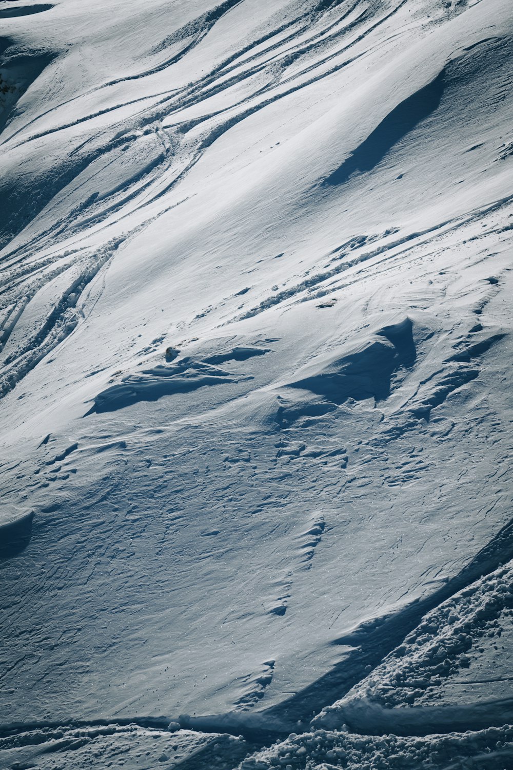 snow covered mountain during daytime