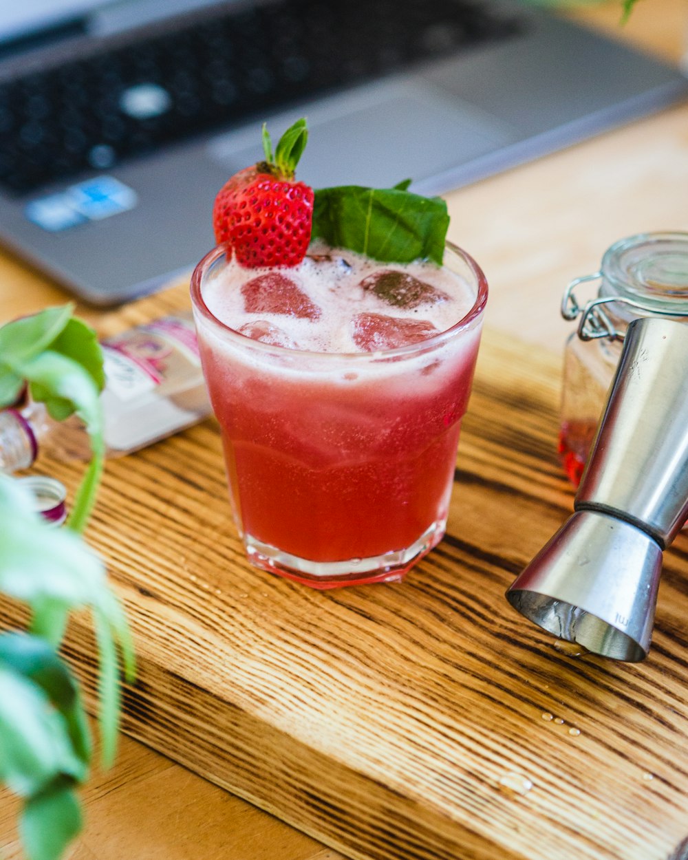 strawberry shake in clear drinking glass