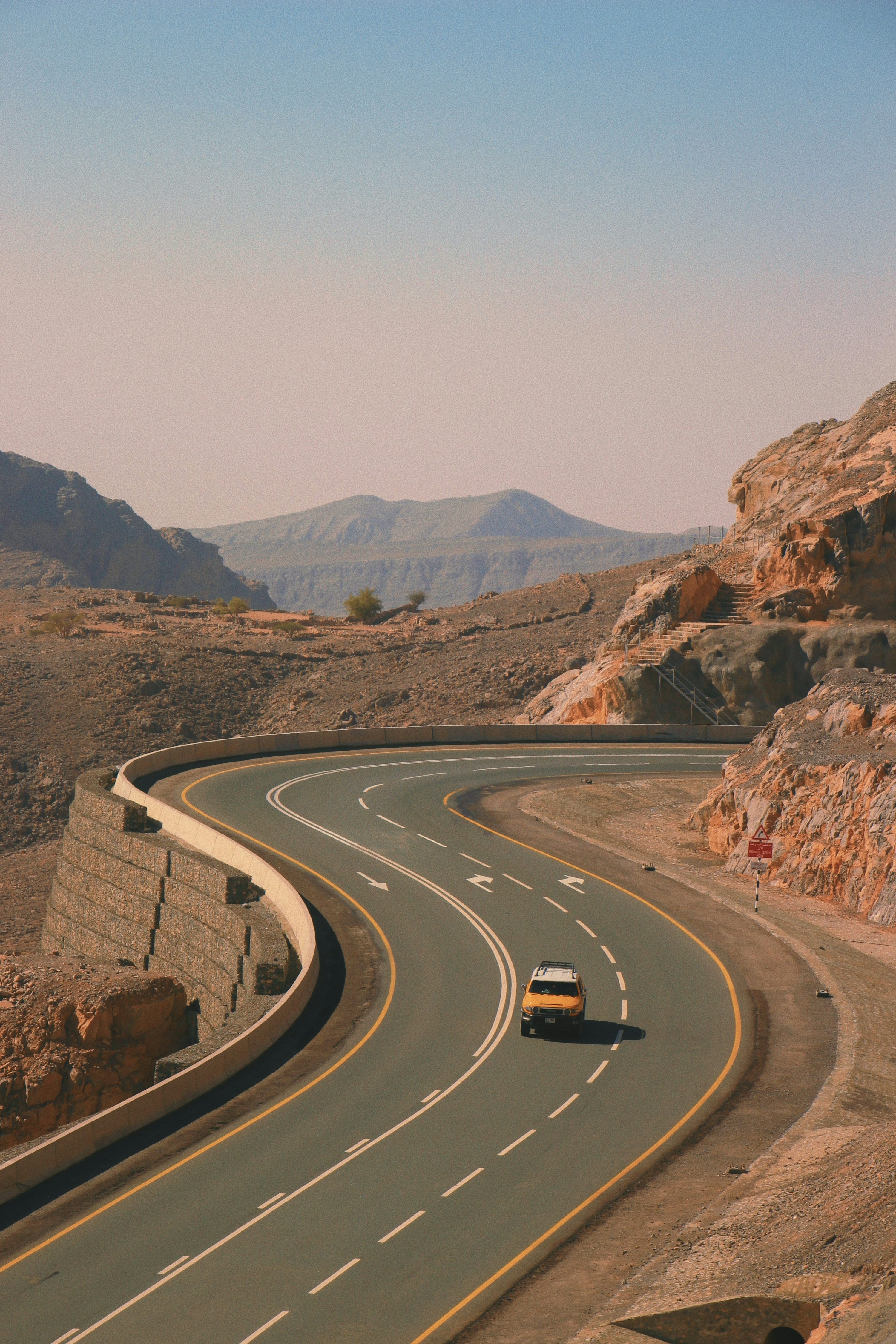 black car on road during daytime