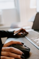 Person tutoring on laptop in free virtual tutoring session 