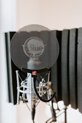 grey round fan on grey metal stand