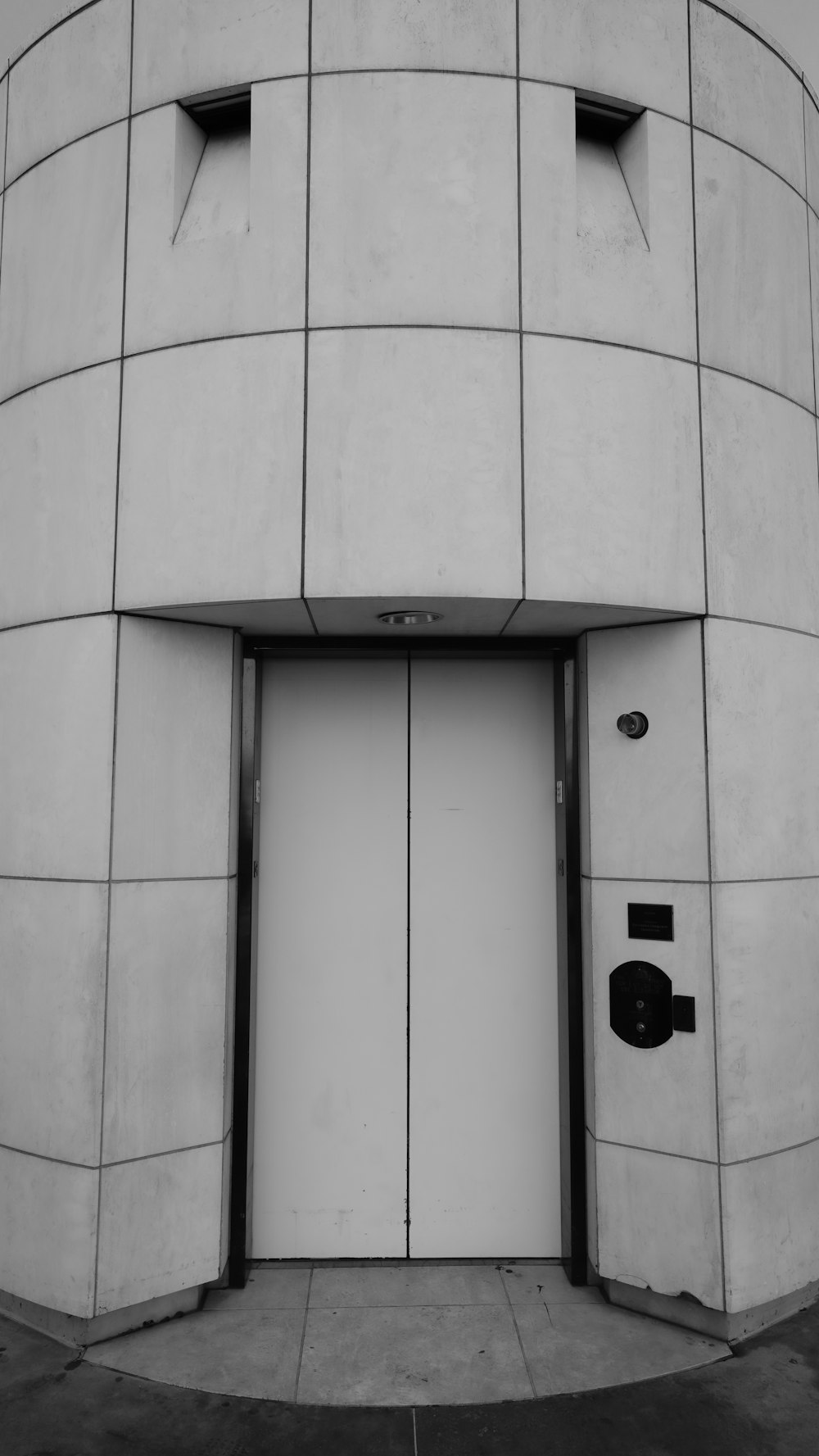 white wooden door with black door lever