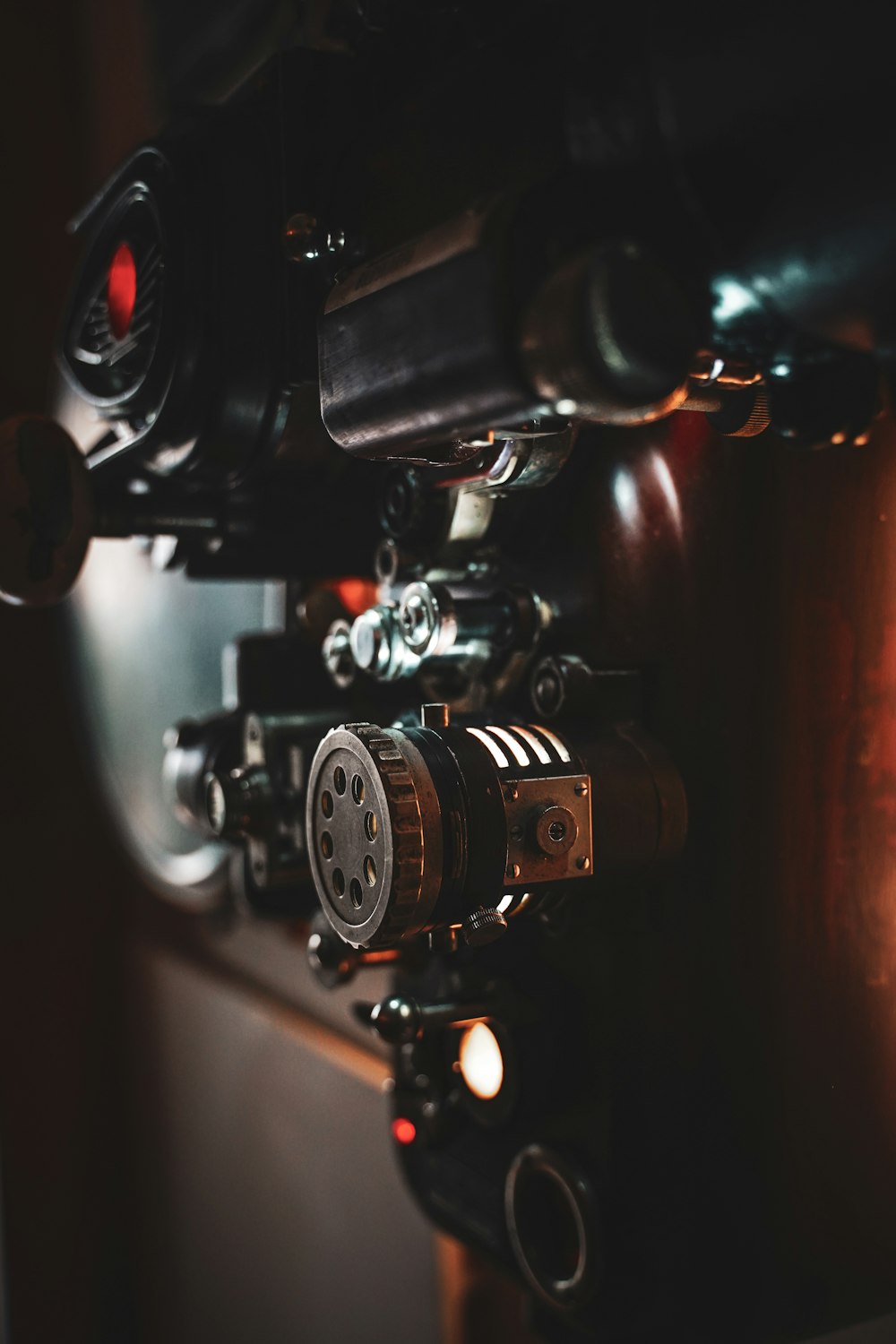 black and silver camera on brown wooden table