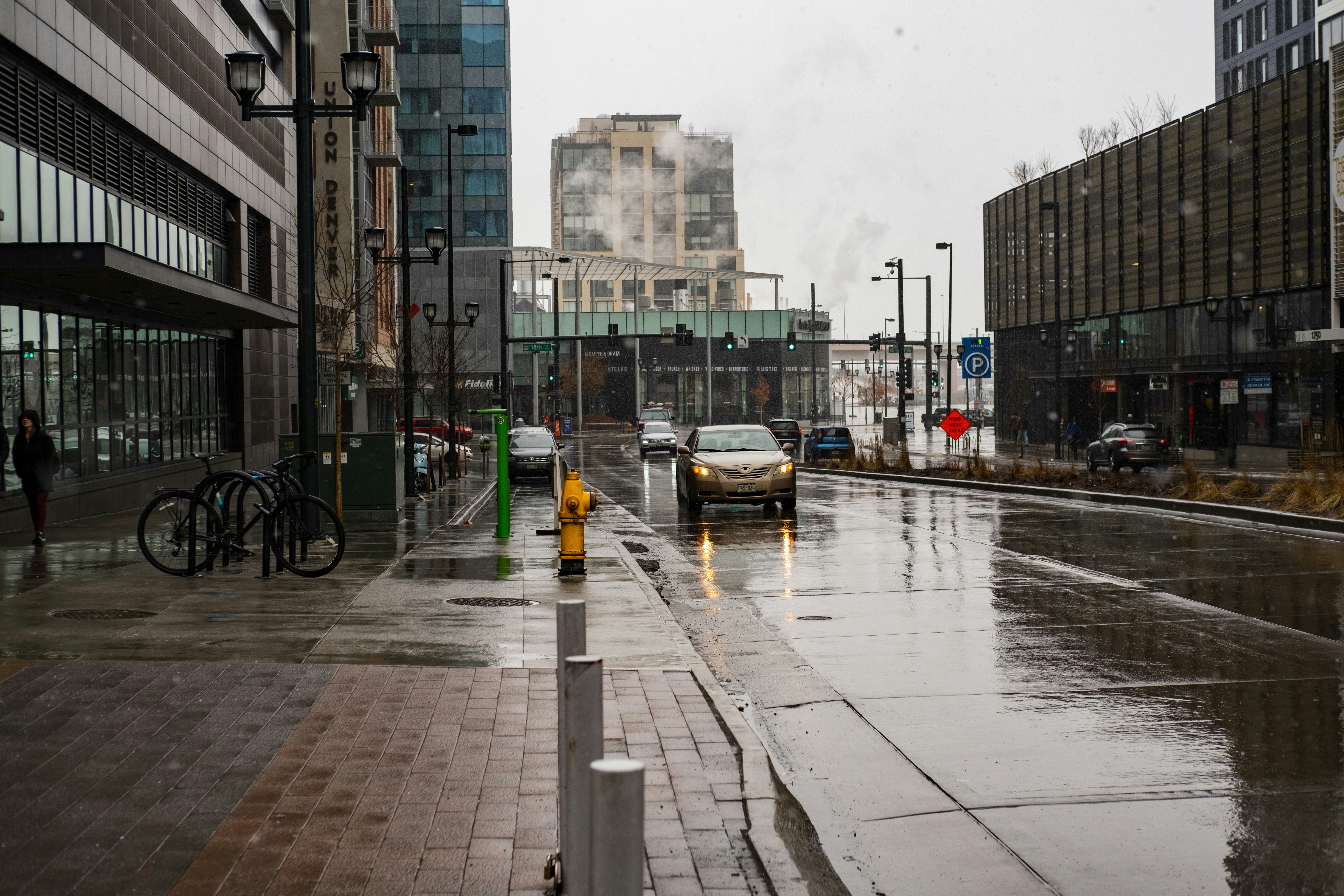 white and yellow bus on road during daytime