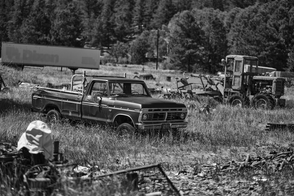 grayscale photo of vintage car