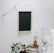brown wooden rectangular frame on white wall