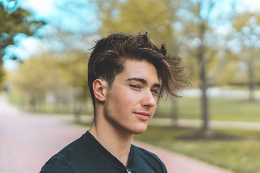 man in black v neck shirt