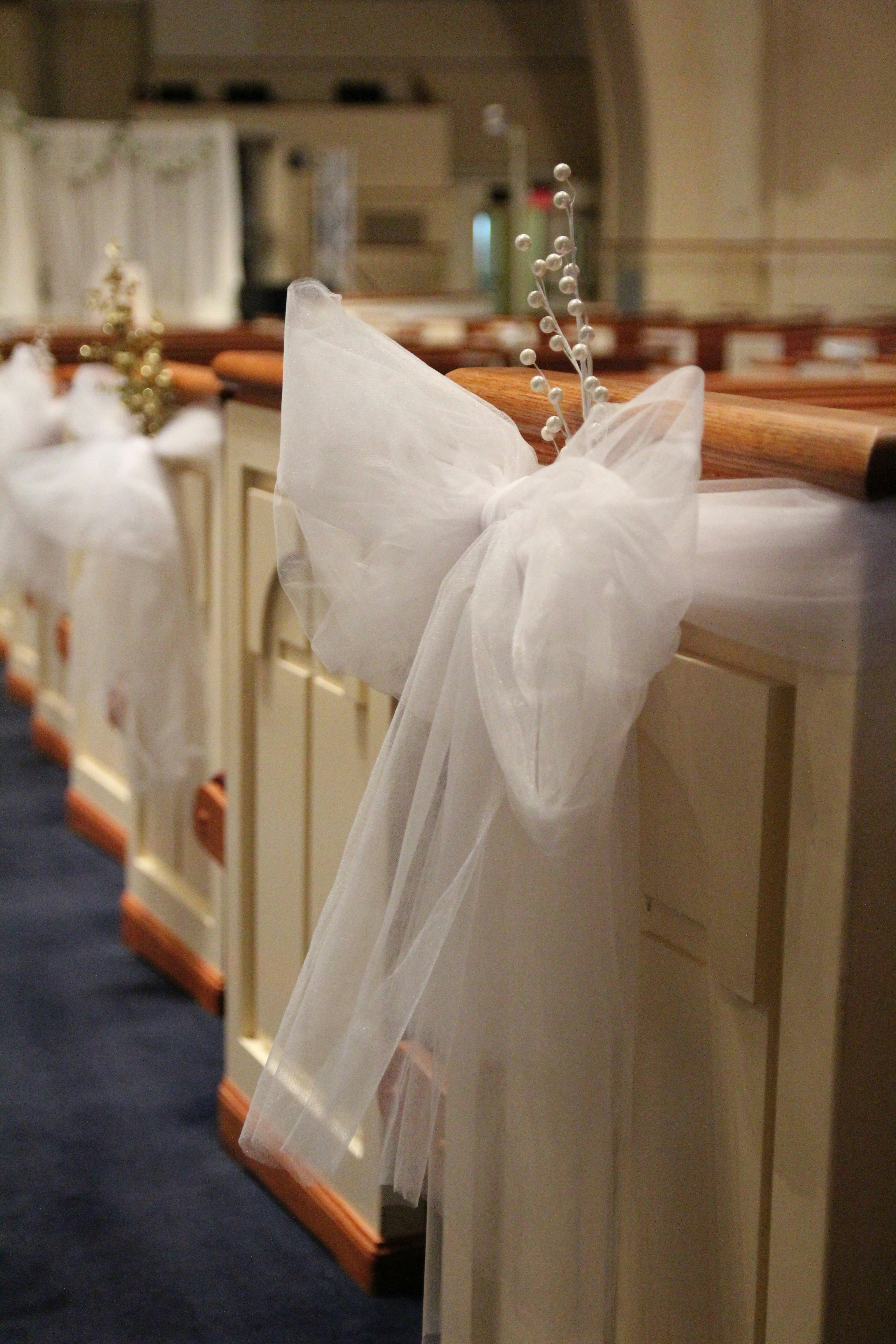 white textile on brown wooden table