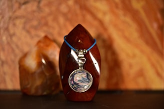 A large amazonite sculpture capturing the natural beauty of the stone with polished and raw surfaces.