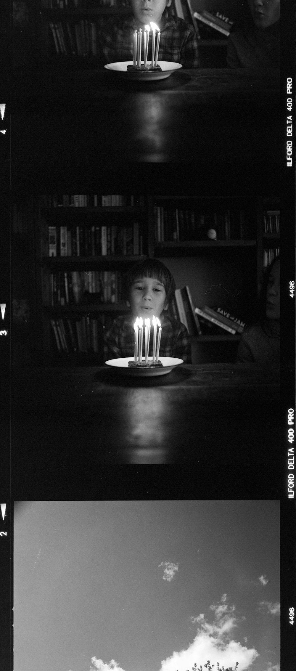 grayscale photo of girl sitting on chair