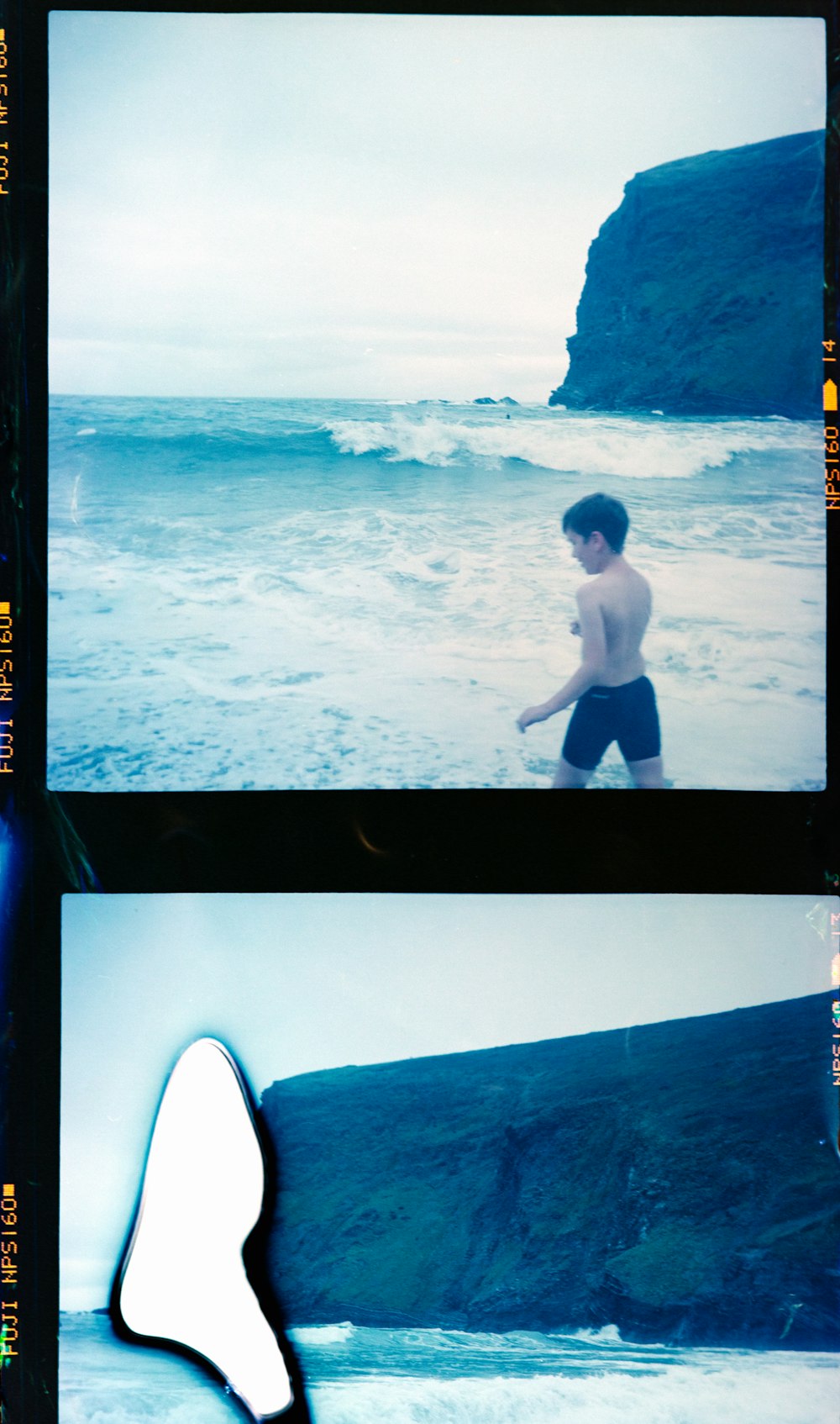 man in black shorts standing on white surfboard on sea during daytime