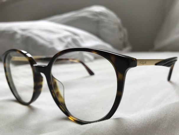 Chic Vogue optical frames resting on a minimalist white marble table