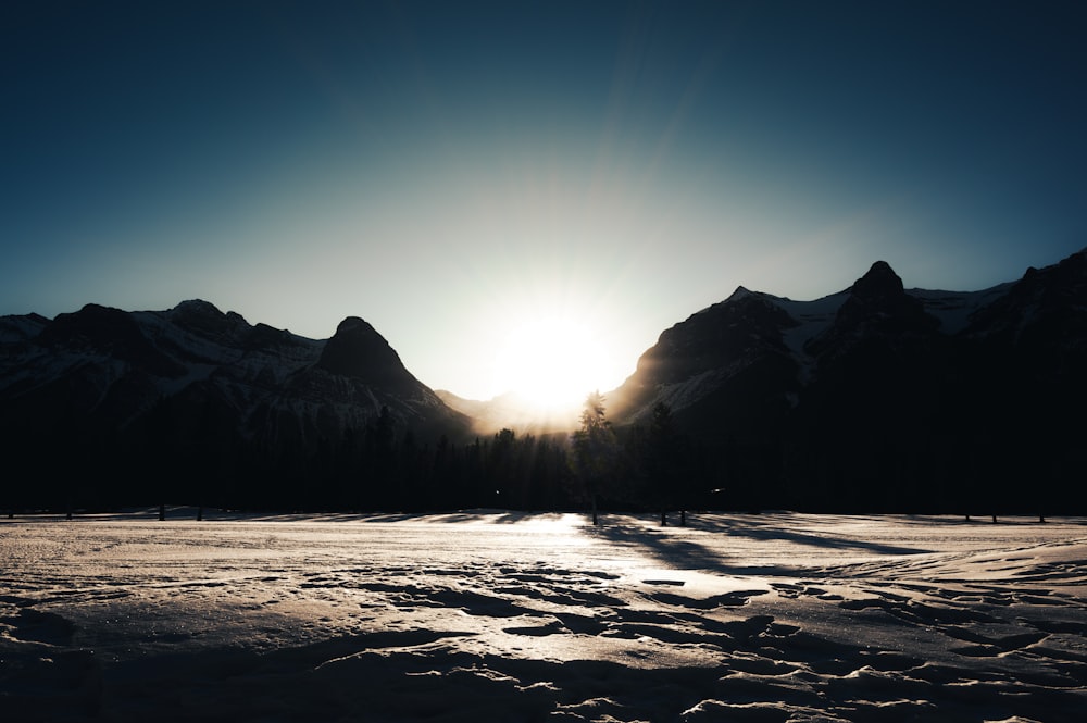 snow covered mountain during daytime