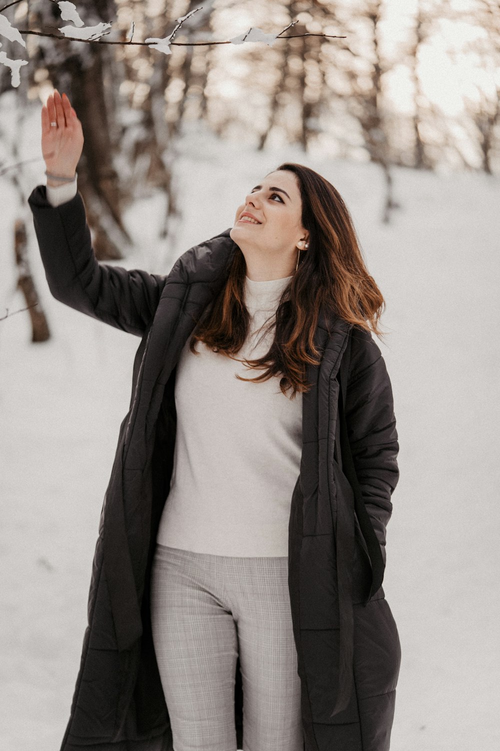 woman in black jacket and white shirt