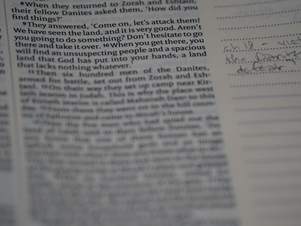 Close-up of handwritten manuscript pages with colorful annotations and edits