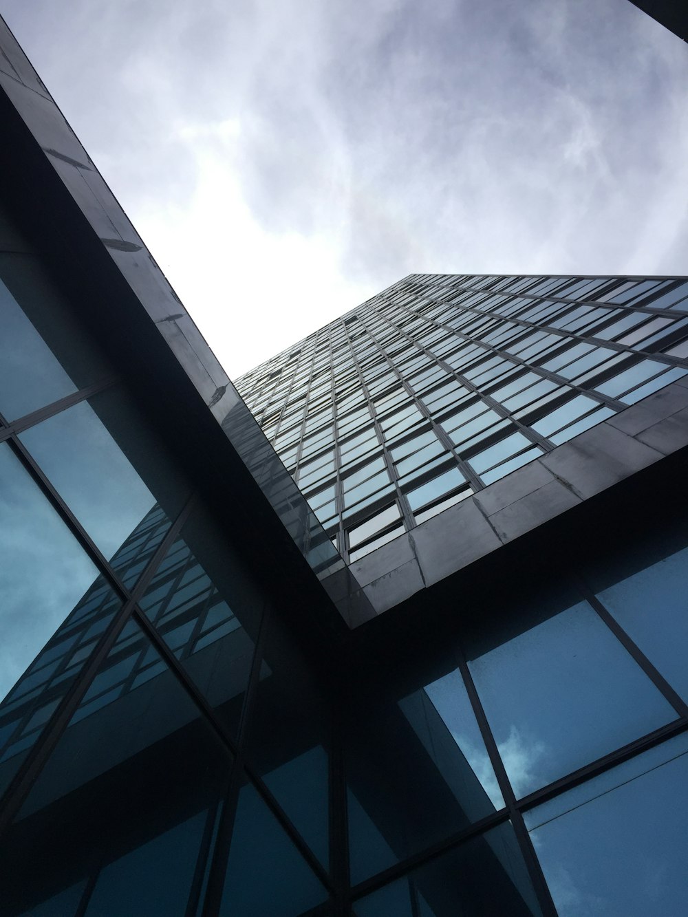 low angle photography of high rise building