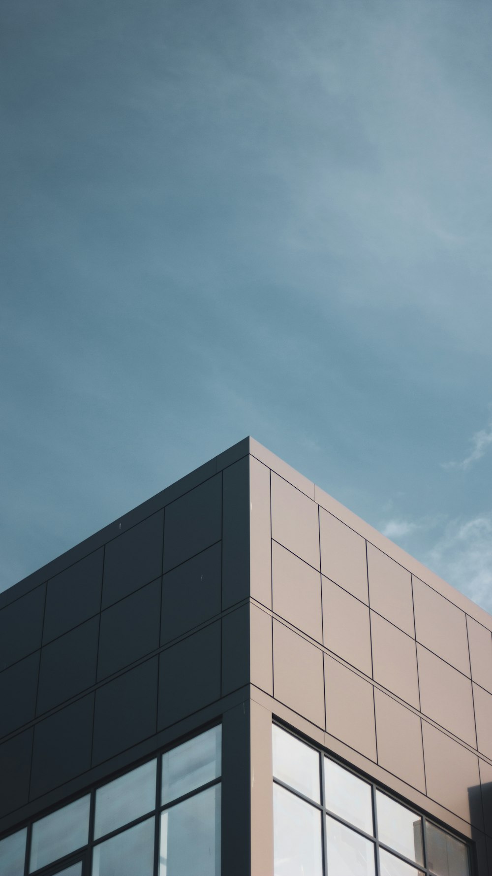 gray concrete building under blue sky during daytime