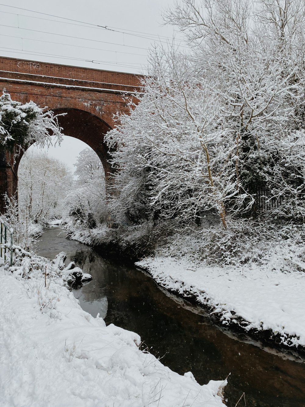 brown concrete bridge over river