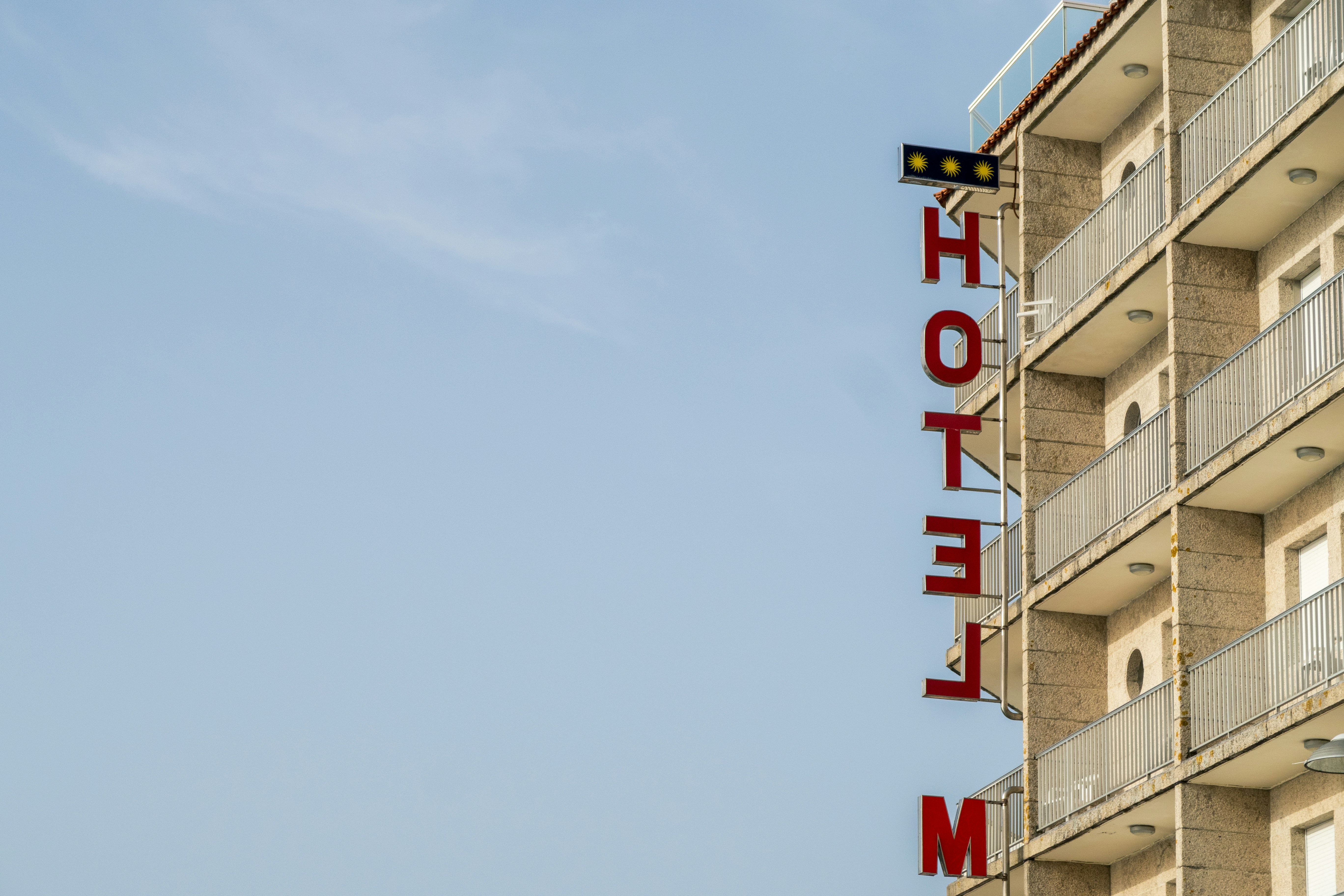 a hotel sign on the side of a building