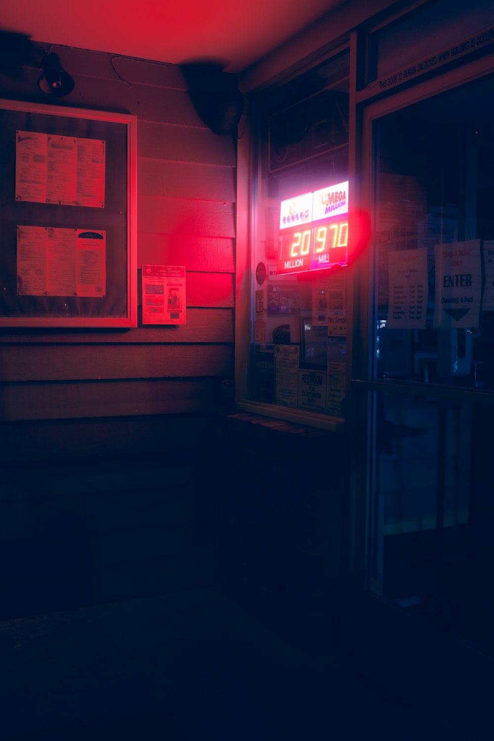 red and white open neon sign