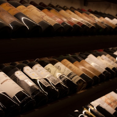 black and white bottles on brown wooden shelf