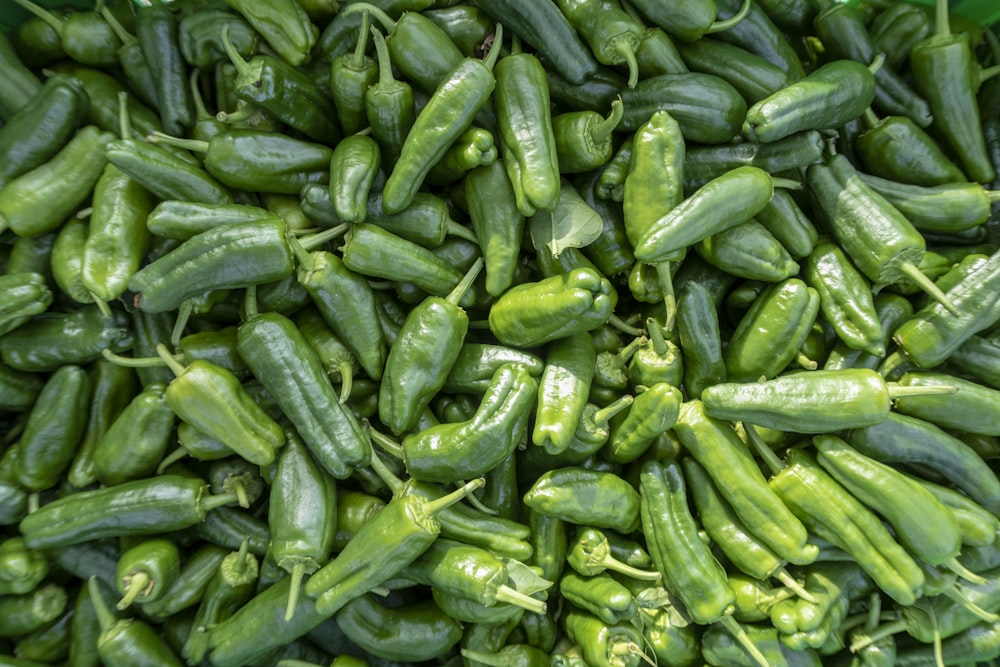 green chili peppers in close up photography