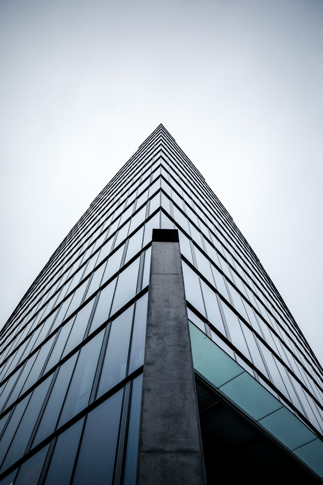 low angle photography of gray concrete building